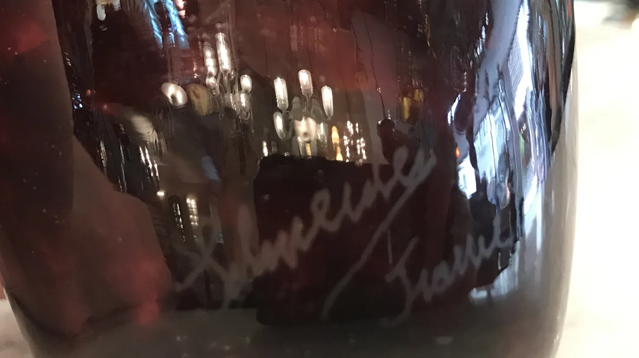 antique signed glass by schneider featuring elegant details