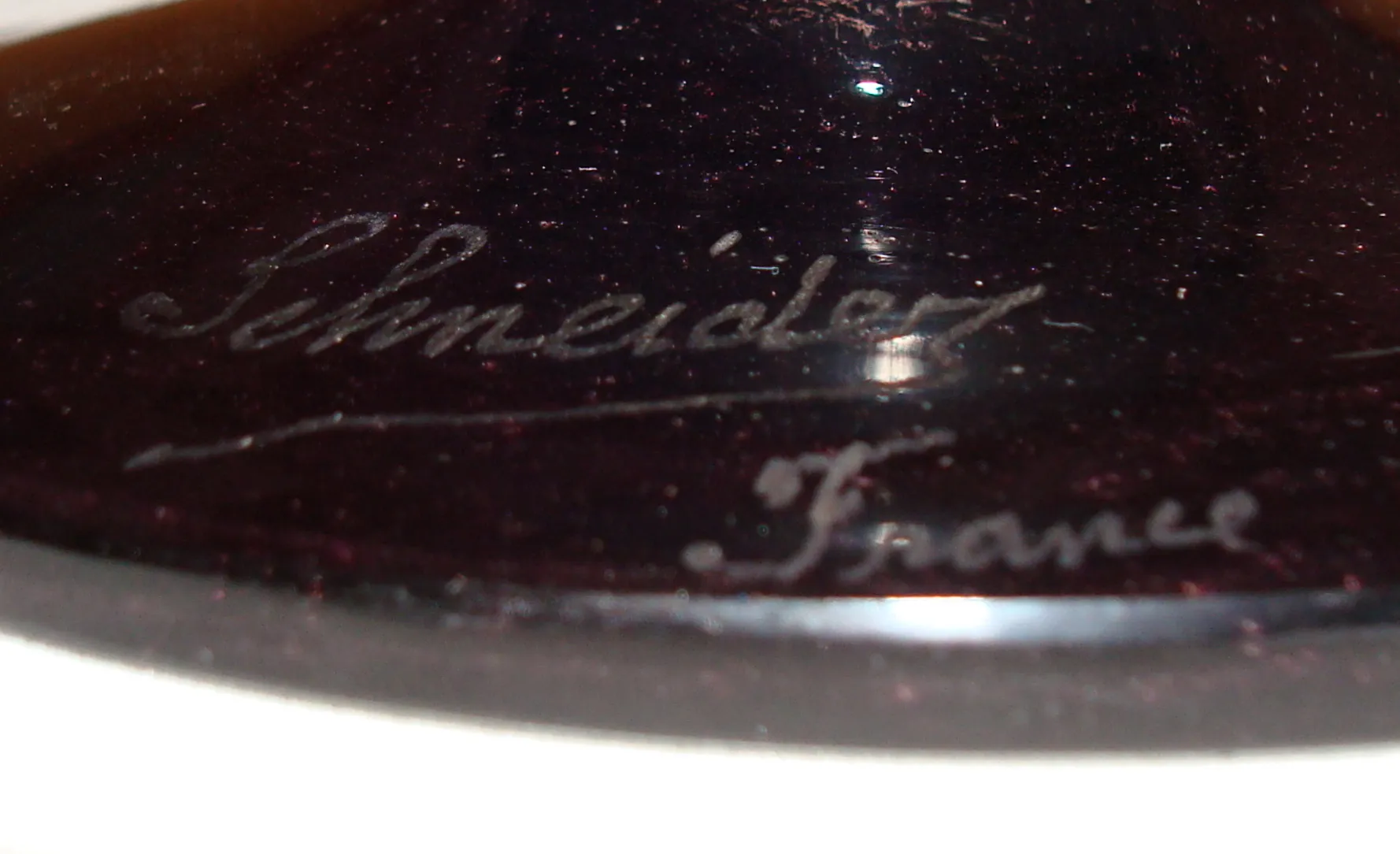 Antique glass featuring Schneider's signature, French style