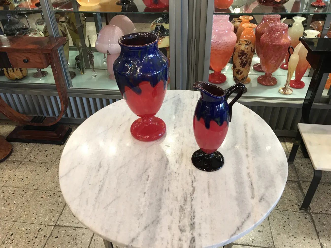 Antique signed glass by Schneider in blue and red hues.