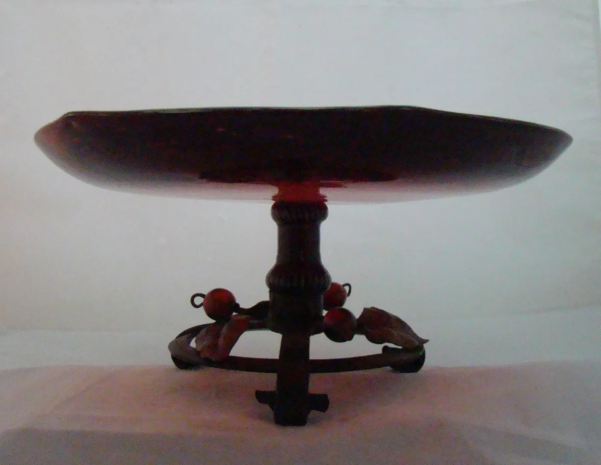 Side view of elegant signed Schneider glass on metal base