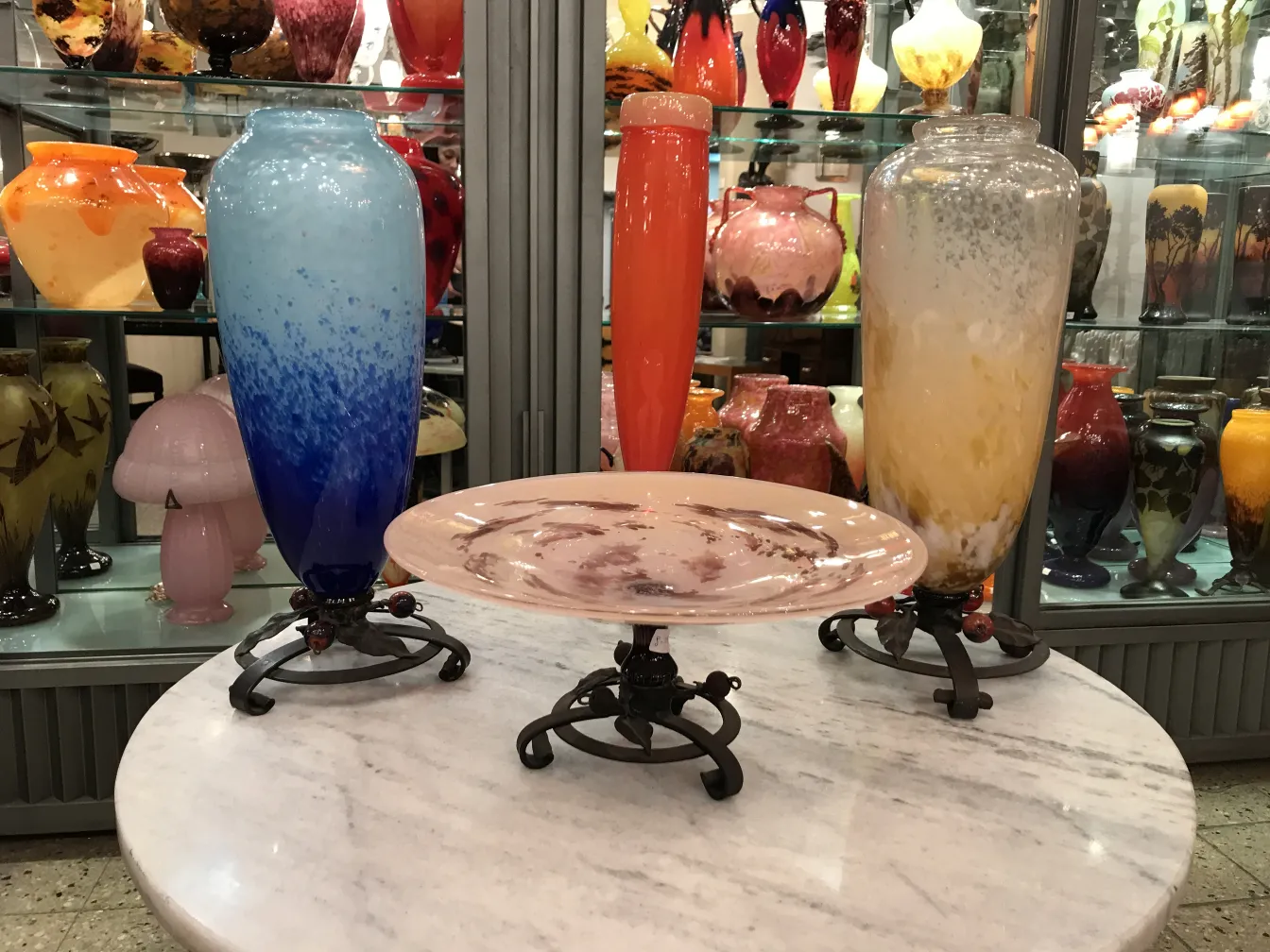 blue and yellow signed glass by schneider on display