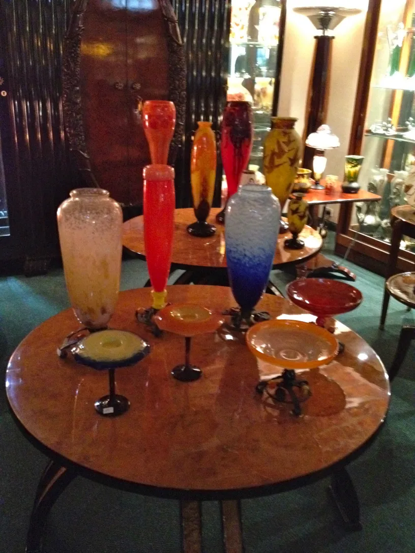 colorful glass vases on marble table