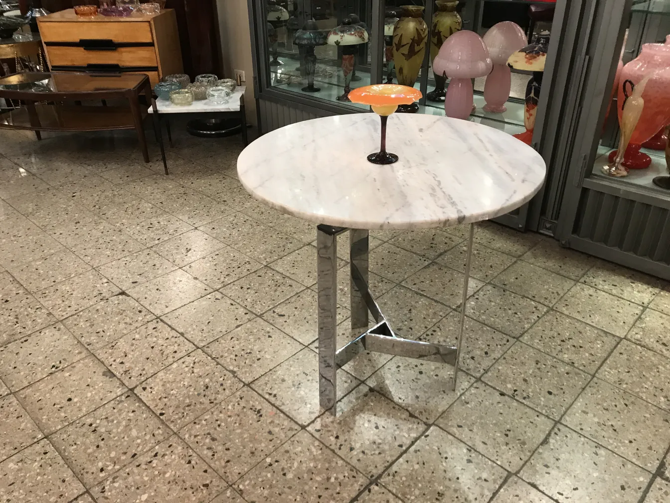 Table with signed glass Schneider, antique pieces.
