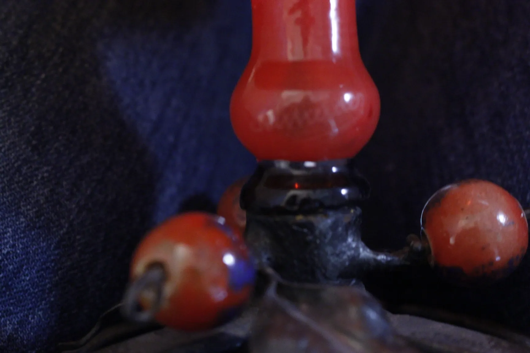 antique signed glass with black base and red details