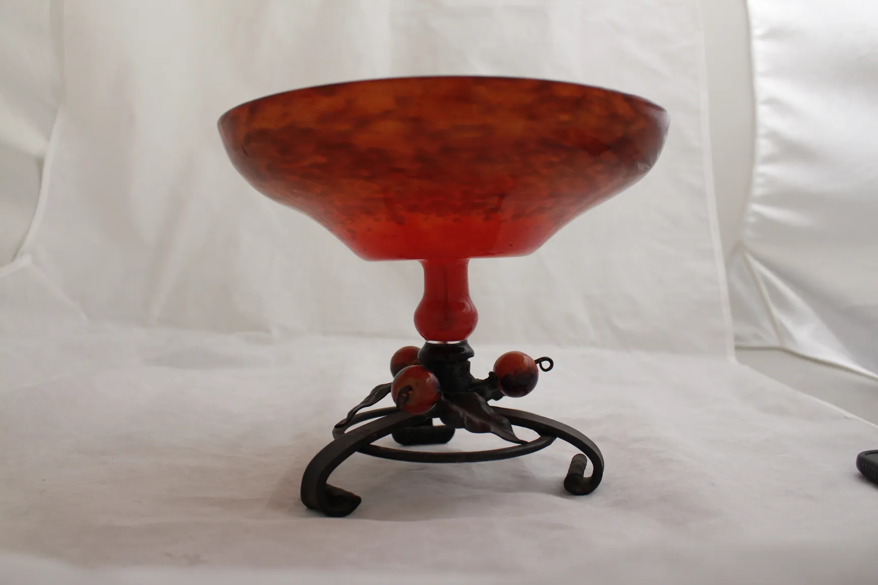 Antique glass featuring Schneider signature on decorative base