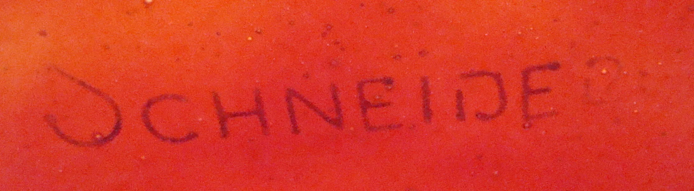 Antique glass signed by Schneider in red with details.