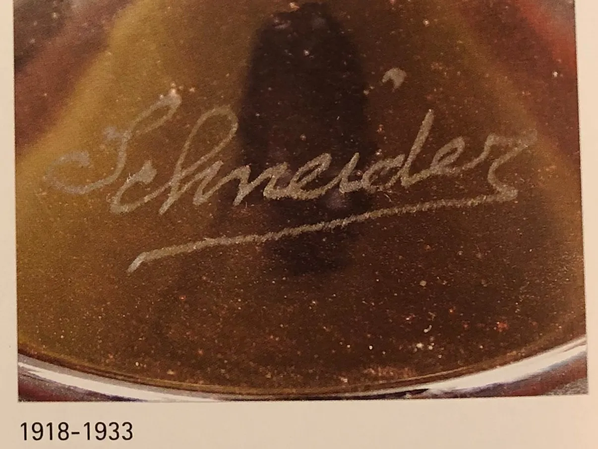 signed glass by schneider with visible inscription detail