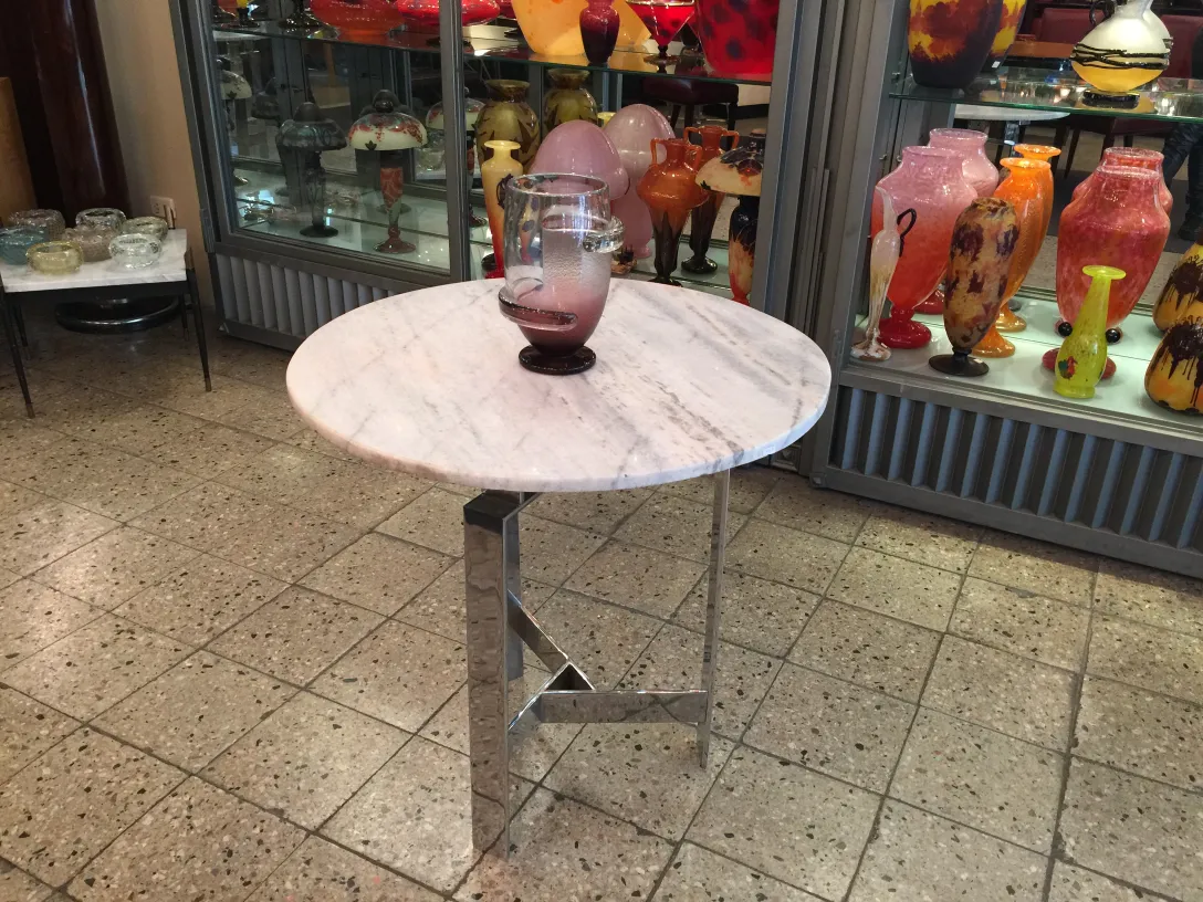 SIGNED GLASS Schneider on a table surrounded by antiques