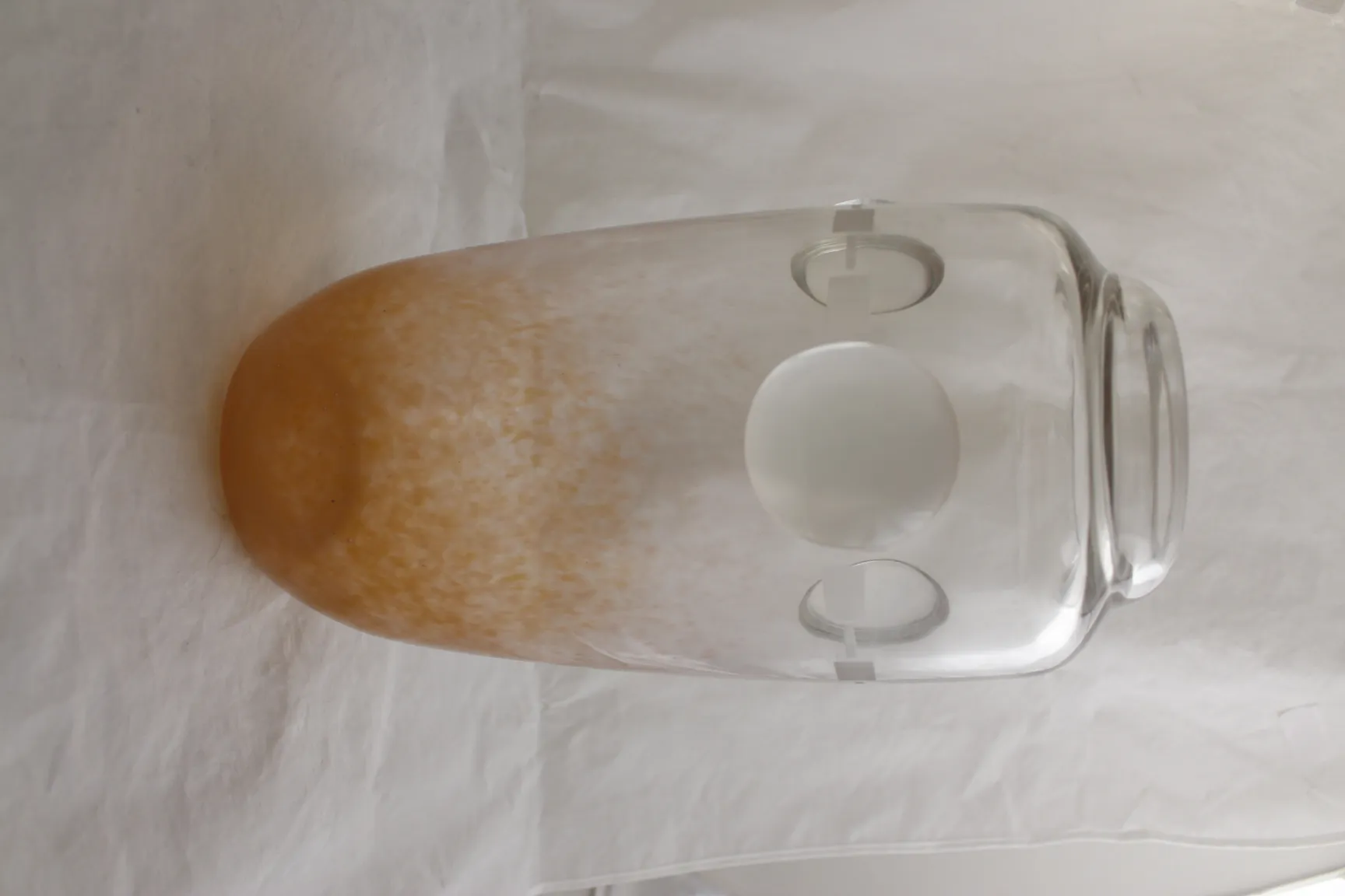 Round-shaped signed glass, antique with soft curves