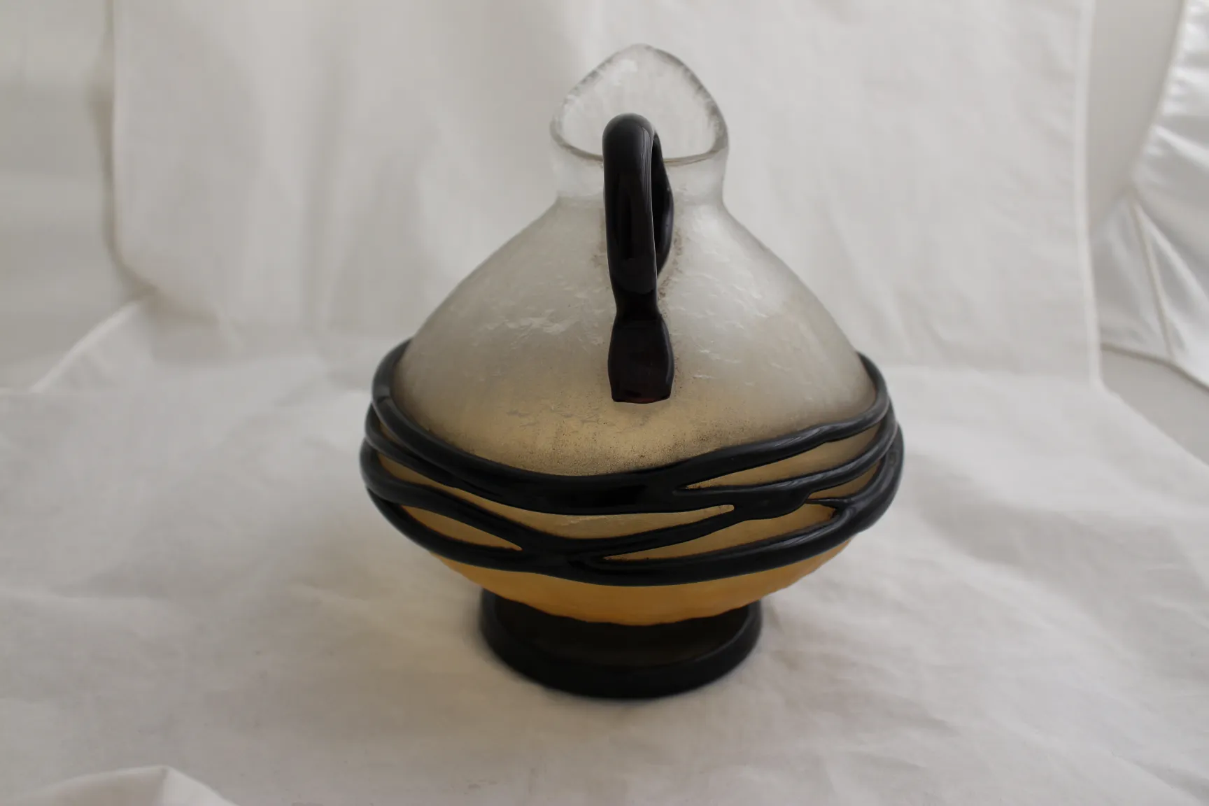 antique signed glass by Schneider in neutral setting