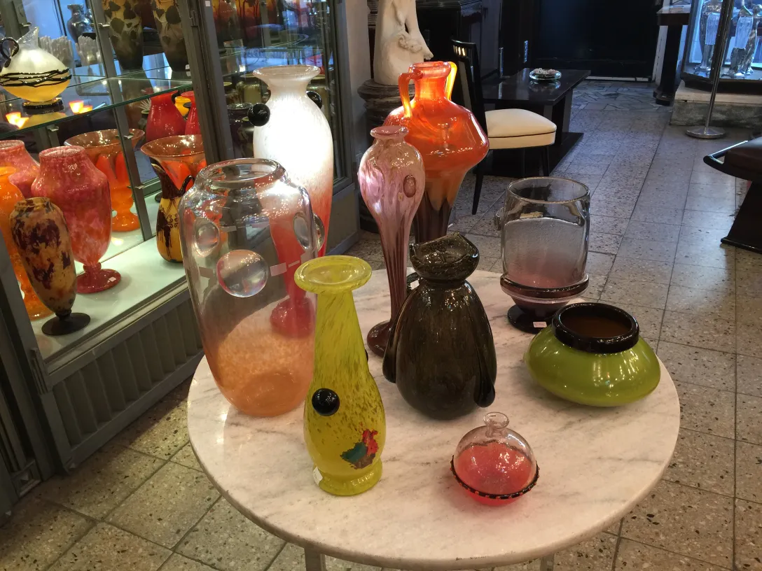 Antique signed glass by Schneider in an antique setting.