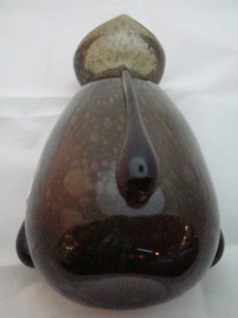 Antique signed glass Schneider with an oval shape in brown tones.