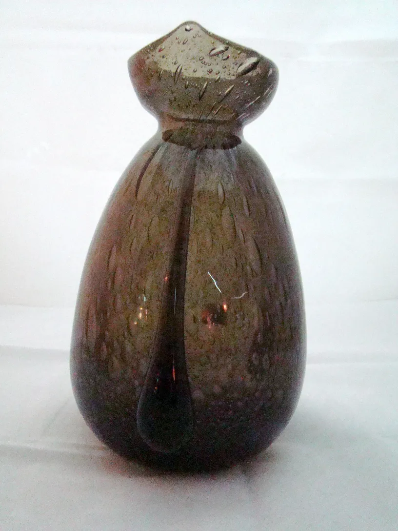 Elegant antique glass with Schneider's signature, distinctive shape