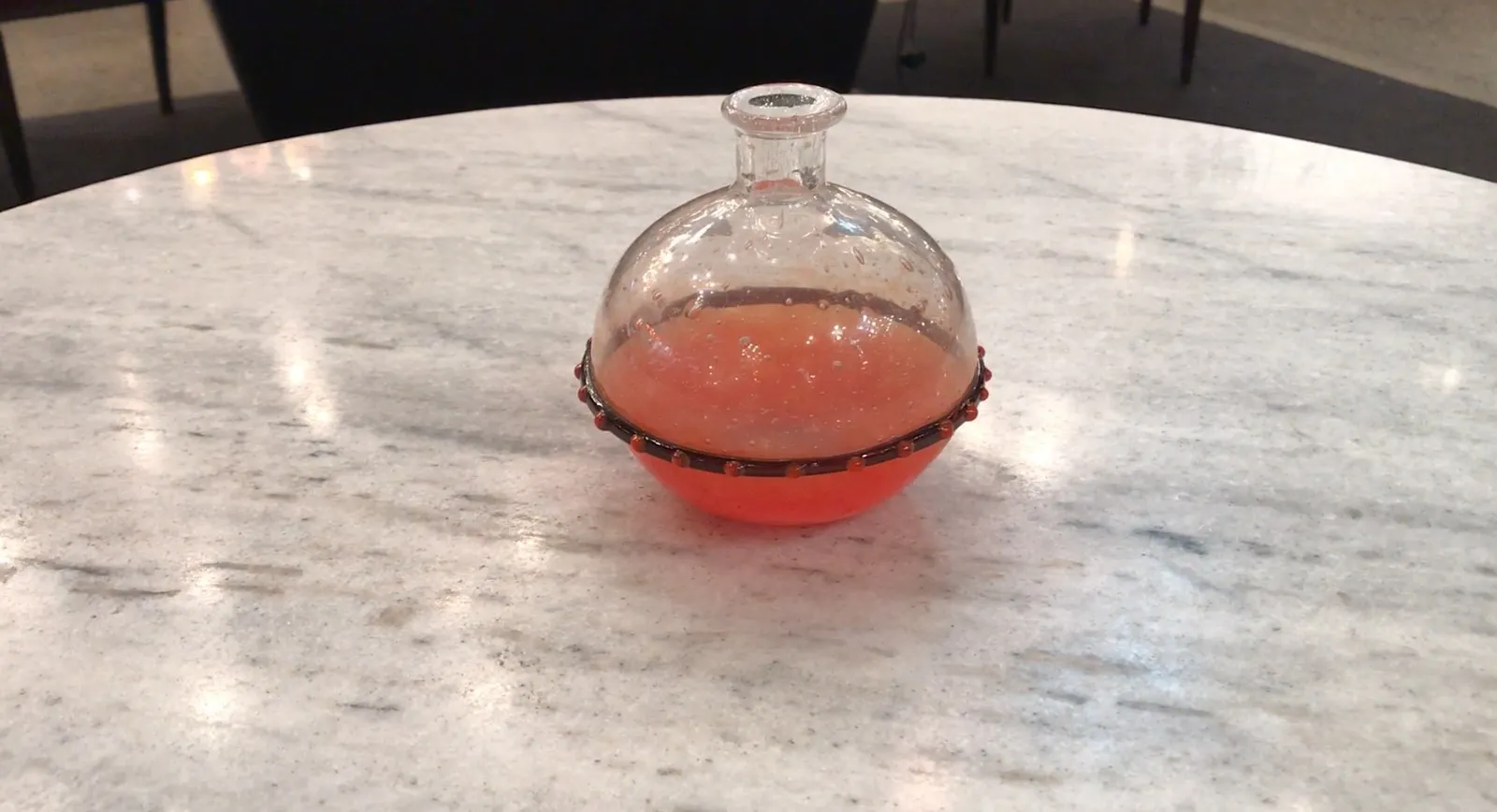 Signed glass Schneider with pink and black details.