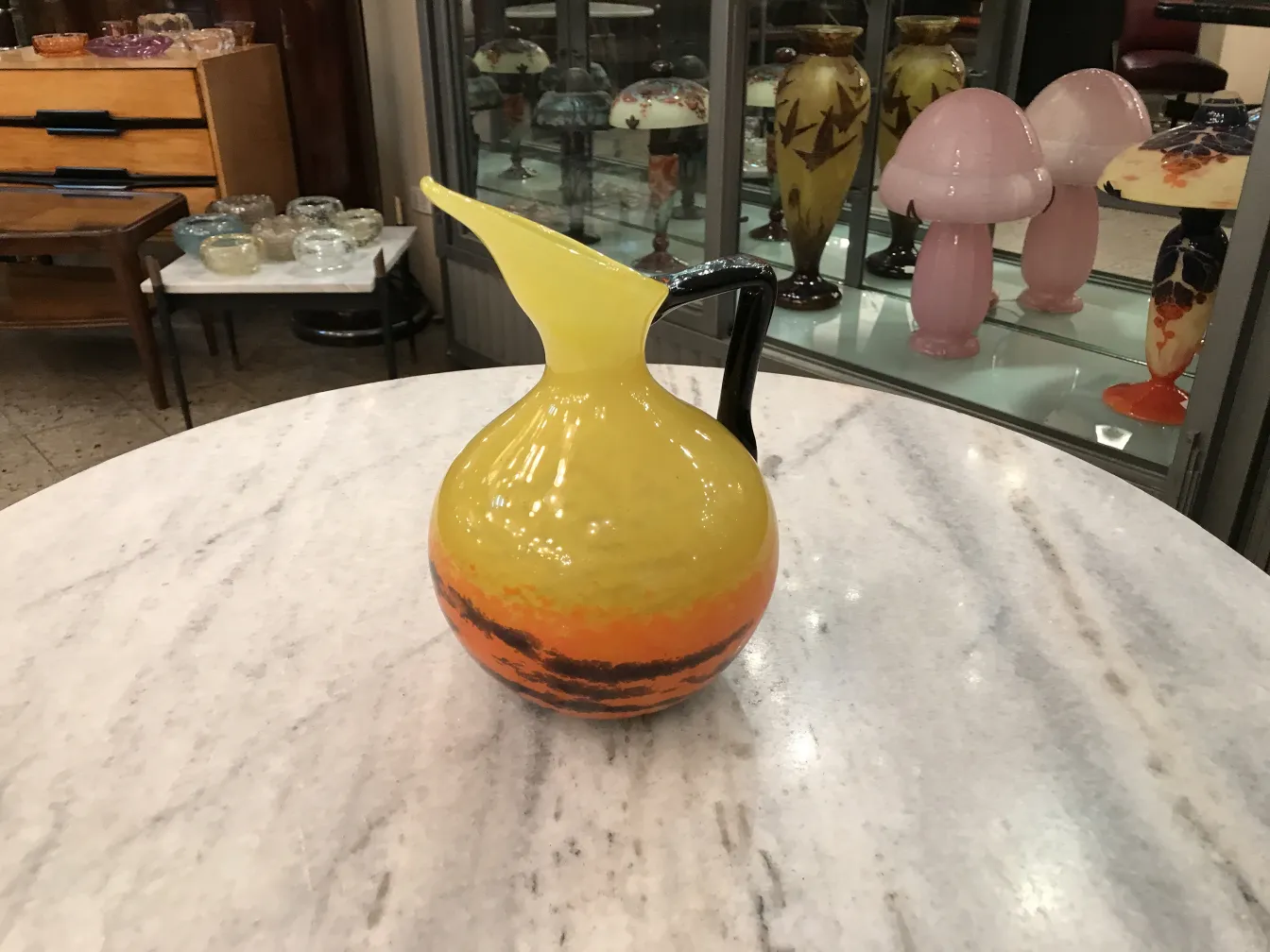 antique jug with warm colors and signature