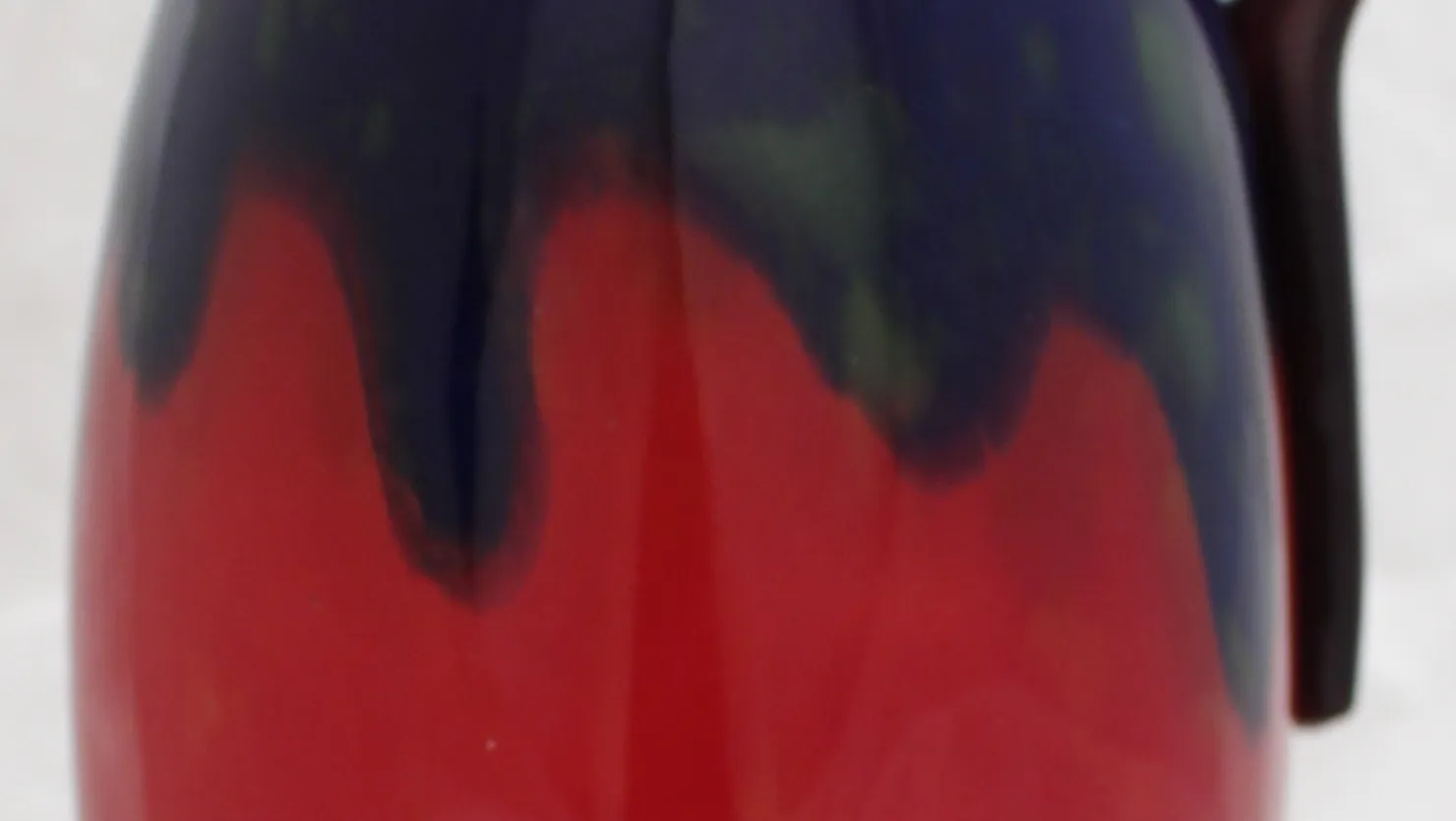 Antique signed glass by Schneider, featuring vibrant colors and an elegant design.