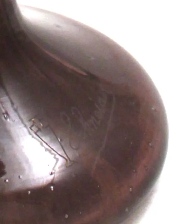 Signed glass by Schneider, antique with unique features