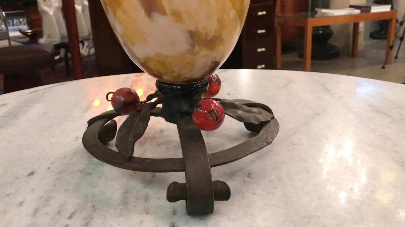 antique signed glass decorative item with yellow and red tones