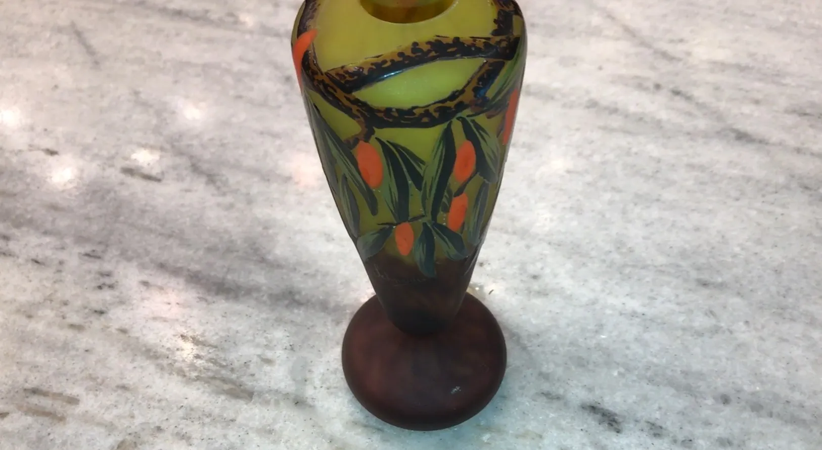 Antique decorative glass with Schneider signature, in yellow and orange tones.