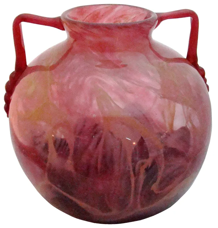 Antique glass vase with red and orange swirl design