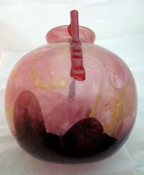 Antique glass with Schneider's signature, pink and black, decorative.