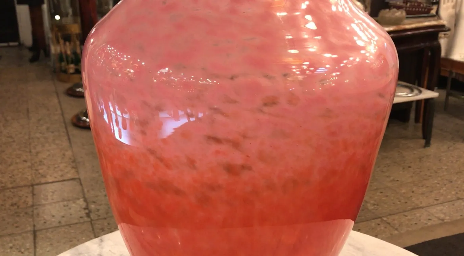 Antique signed glass from Schneider, featuring soft pink tones.