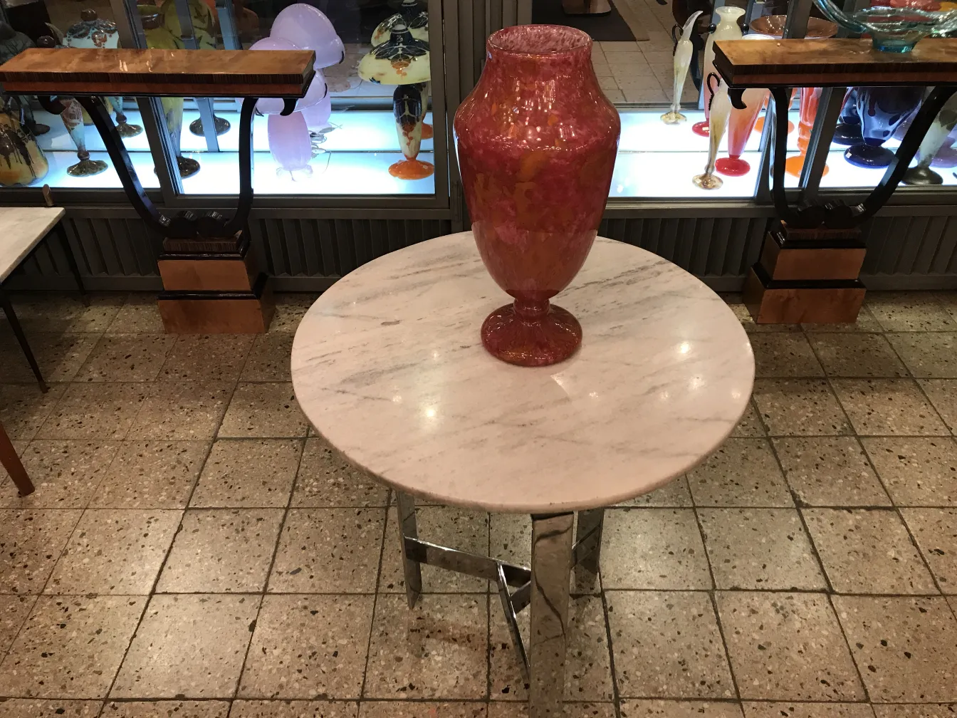 Signed glass vase in shades of pink and orange, elegant antique.