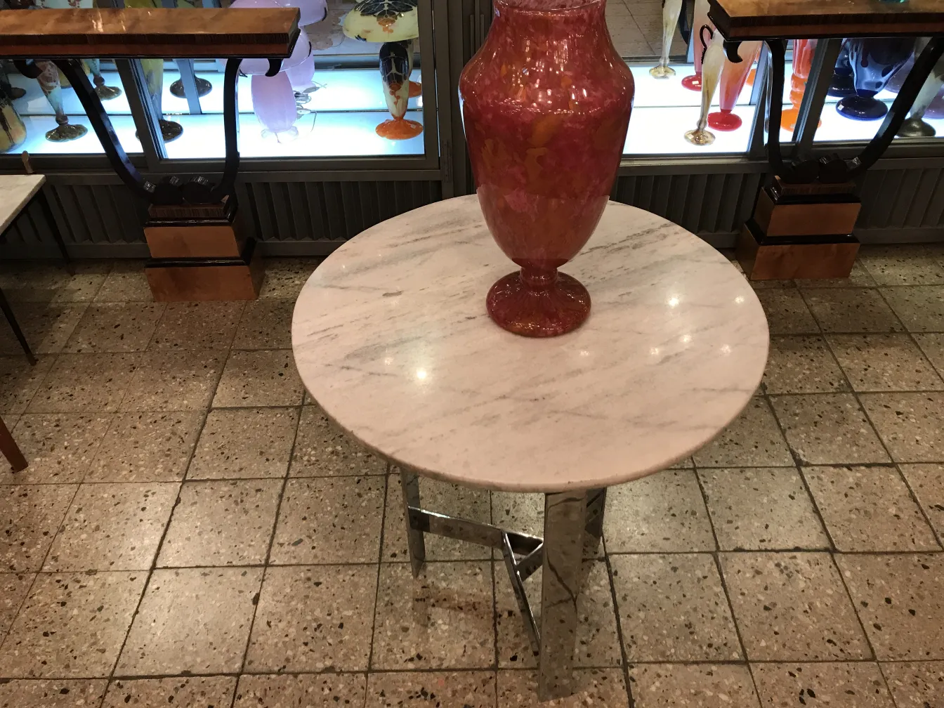 antique piece with signed glass by Schneider on display, unique shape and color