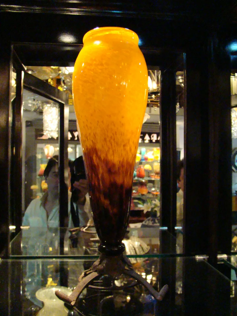 antique vase signed by Schneider displayed in showcase