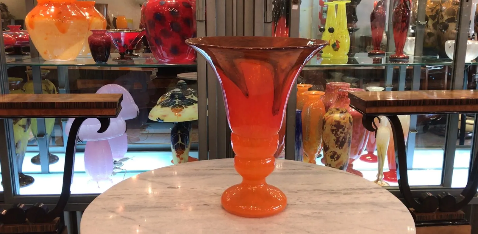 signed glass with vibrant colors in antique setting