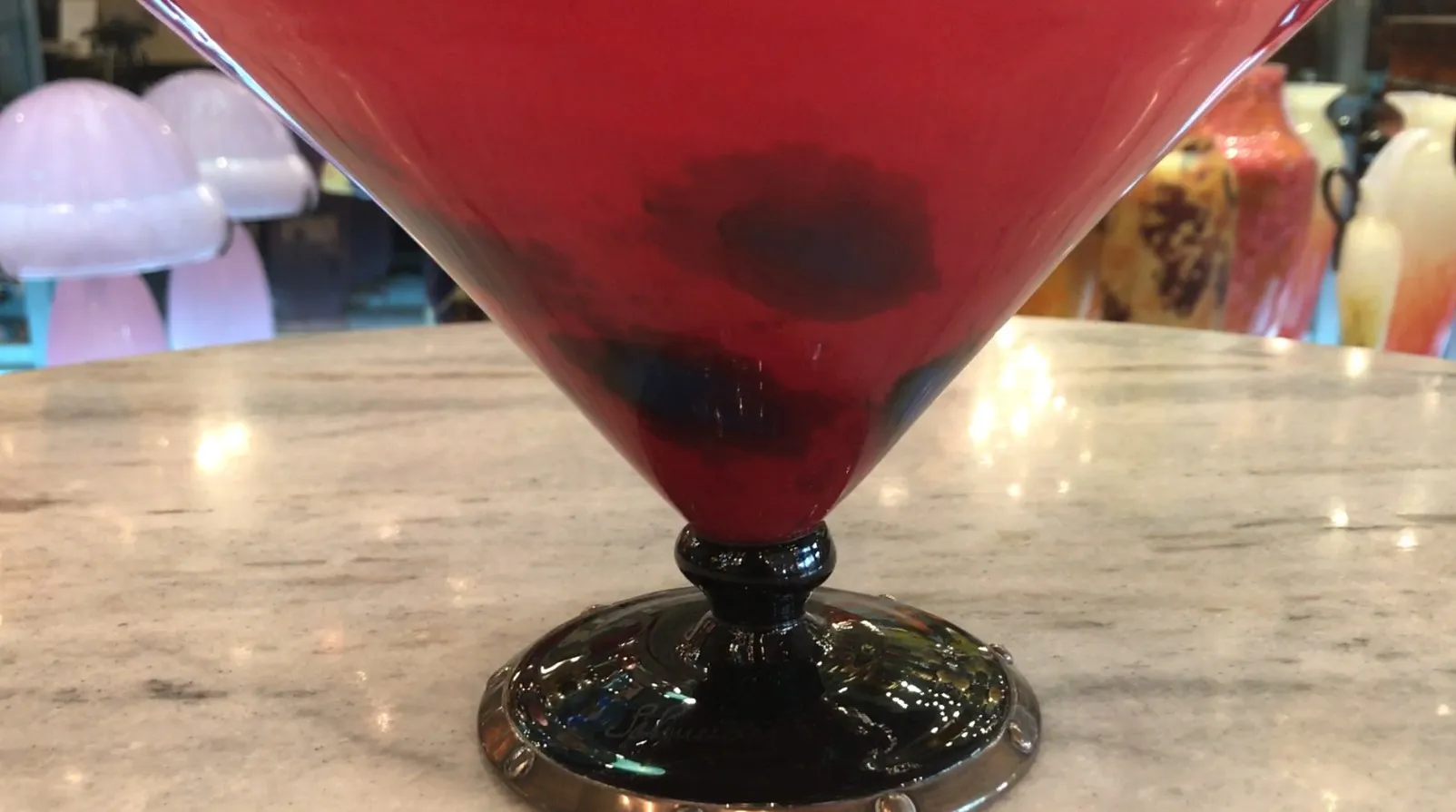 antique glass with black base and red-black design