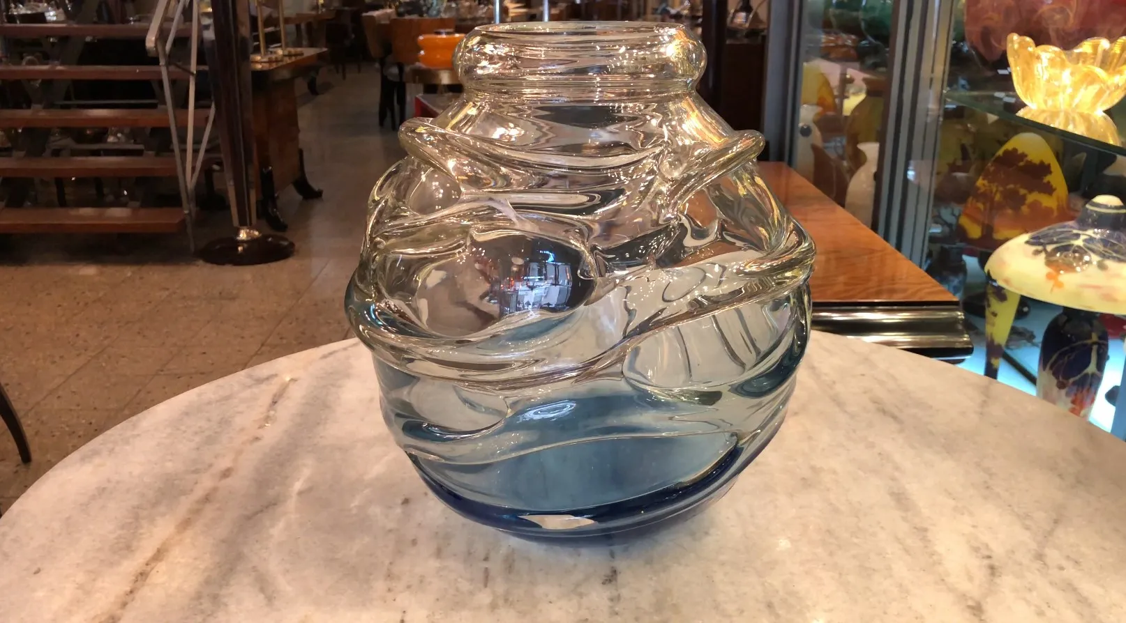 Signed glass by Schneider with decorative details, antique setting.