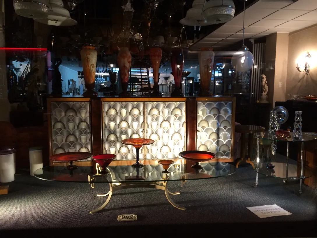 antique signed glass by Schneider displayed in showcase