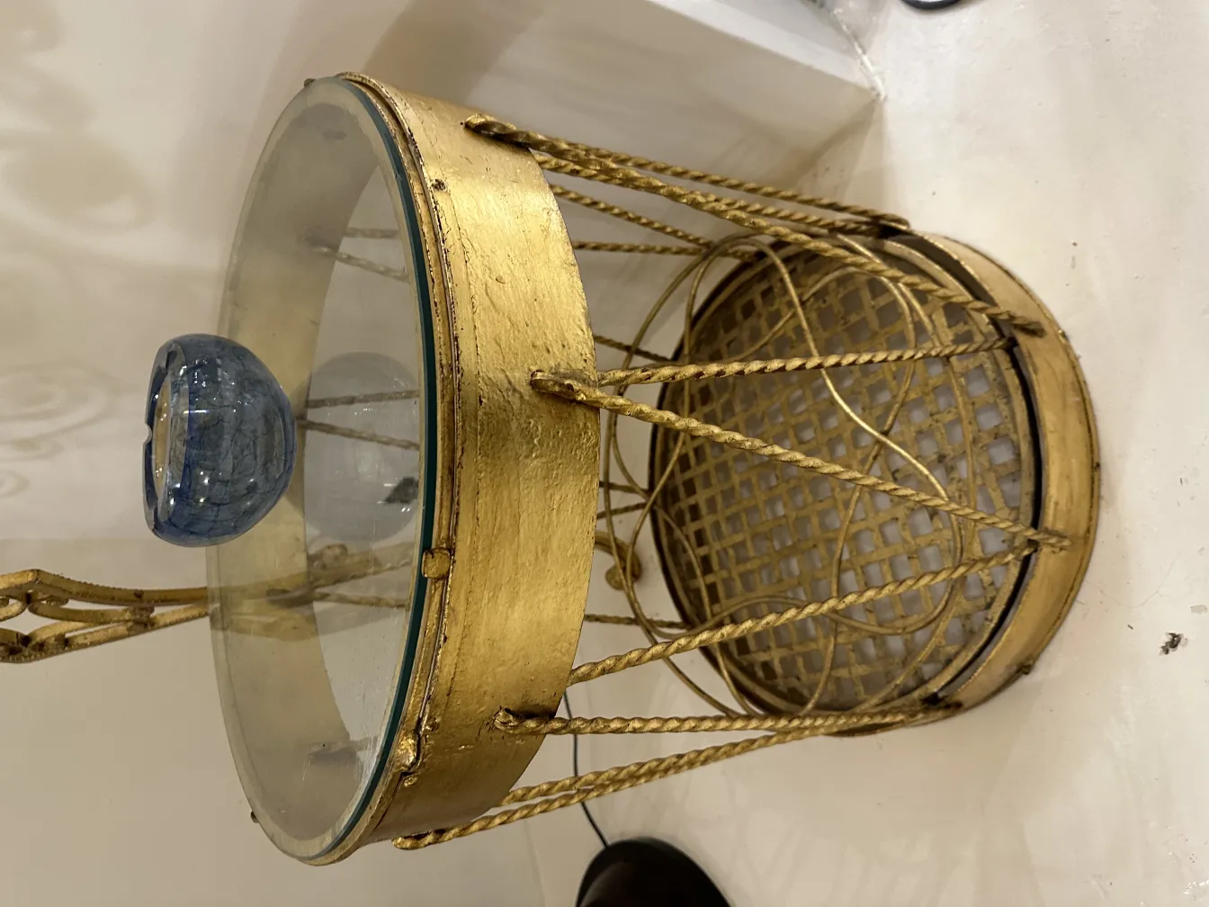 antique murano glass table with golden decorative base, featuring blue detail