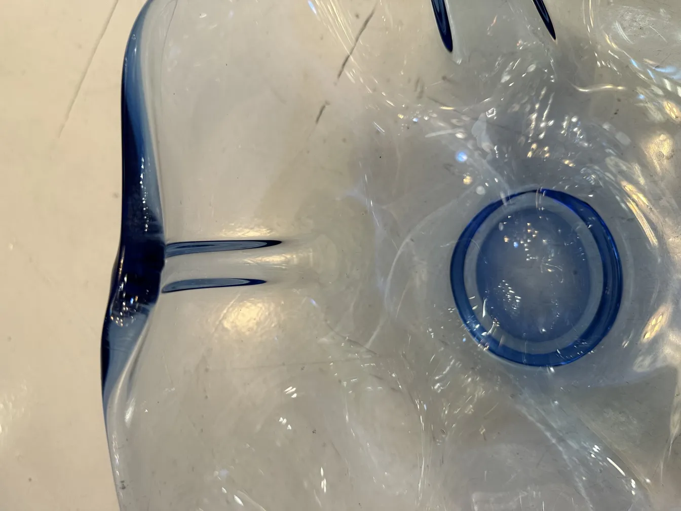 antique decorative piece of murano glass with blue accents