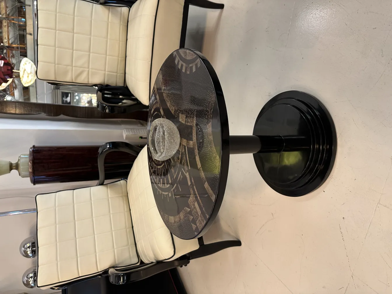 decorative table with antique murano glass and chairs