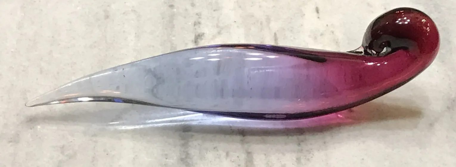 display featuring antique Murano glass in vibrant tones, elegant shape