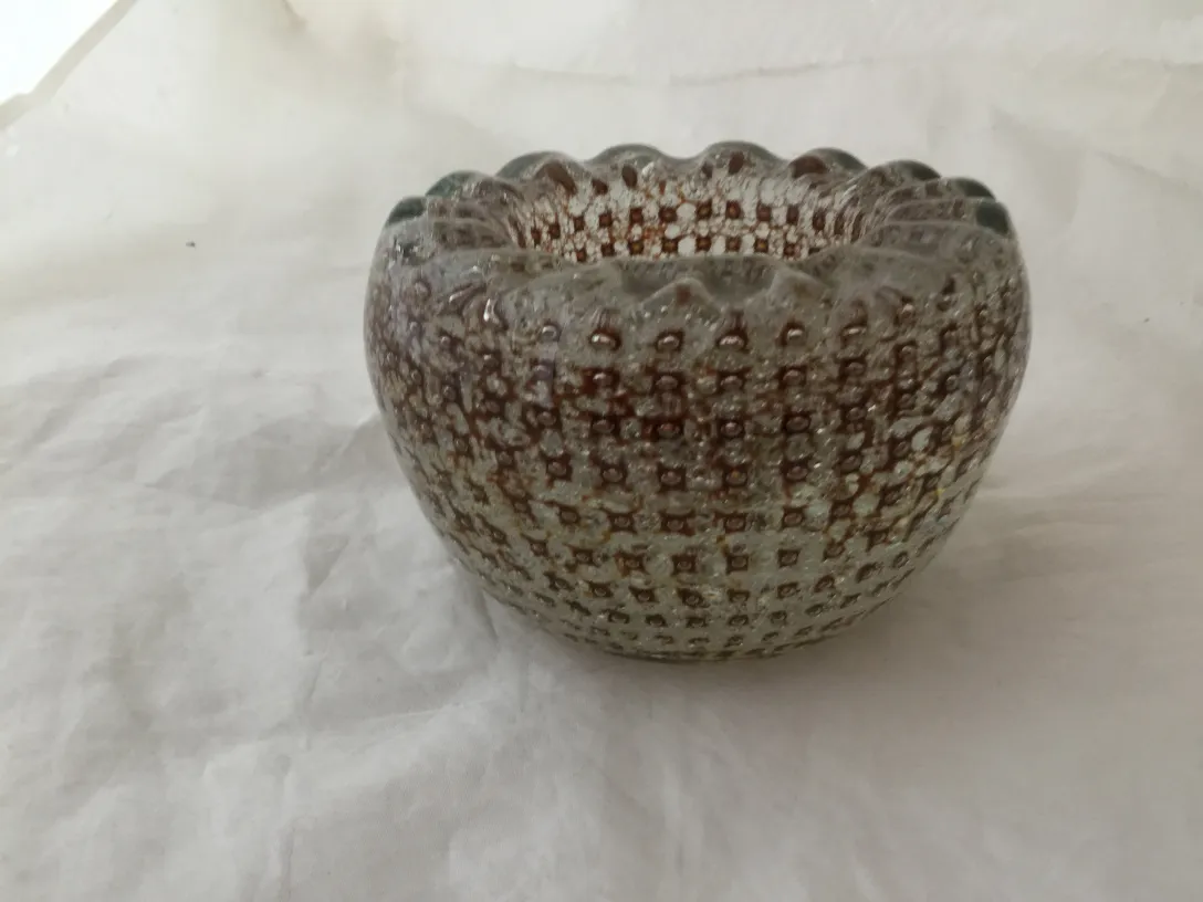 antique murano glass bowl with shiny texture and wavy edges