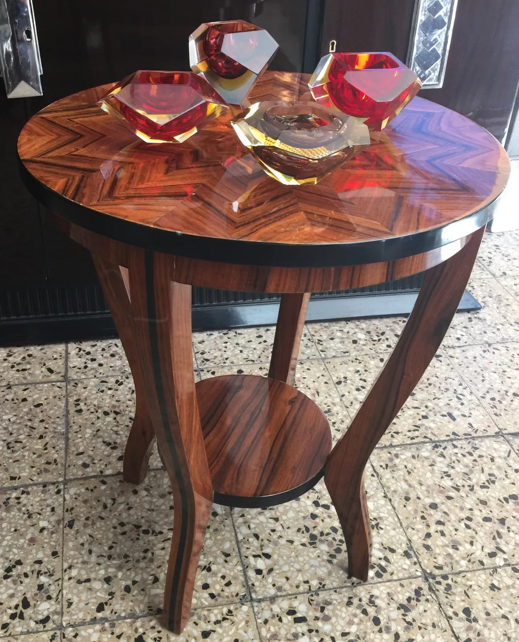 decorative murano glass bowls on antique table