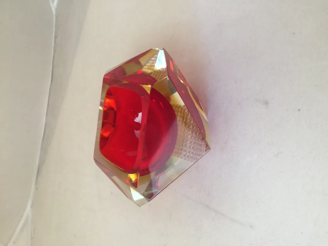 Antique Murano glass with vibrant red color and details
