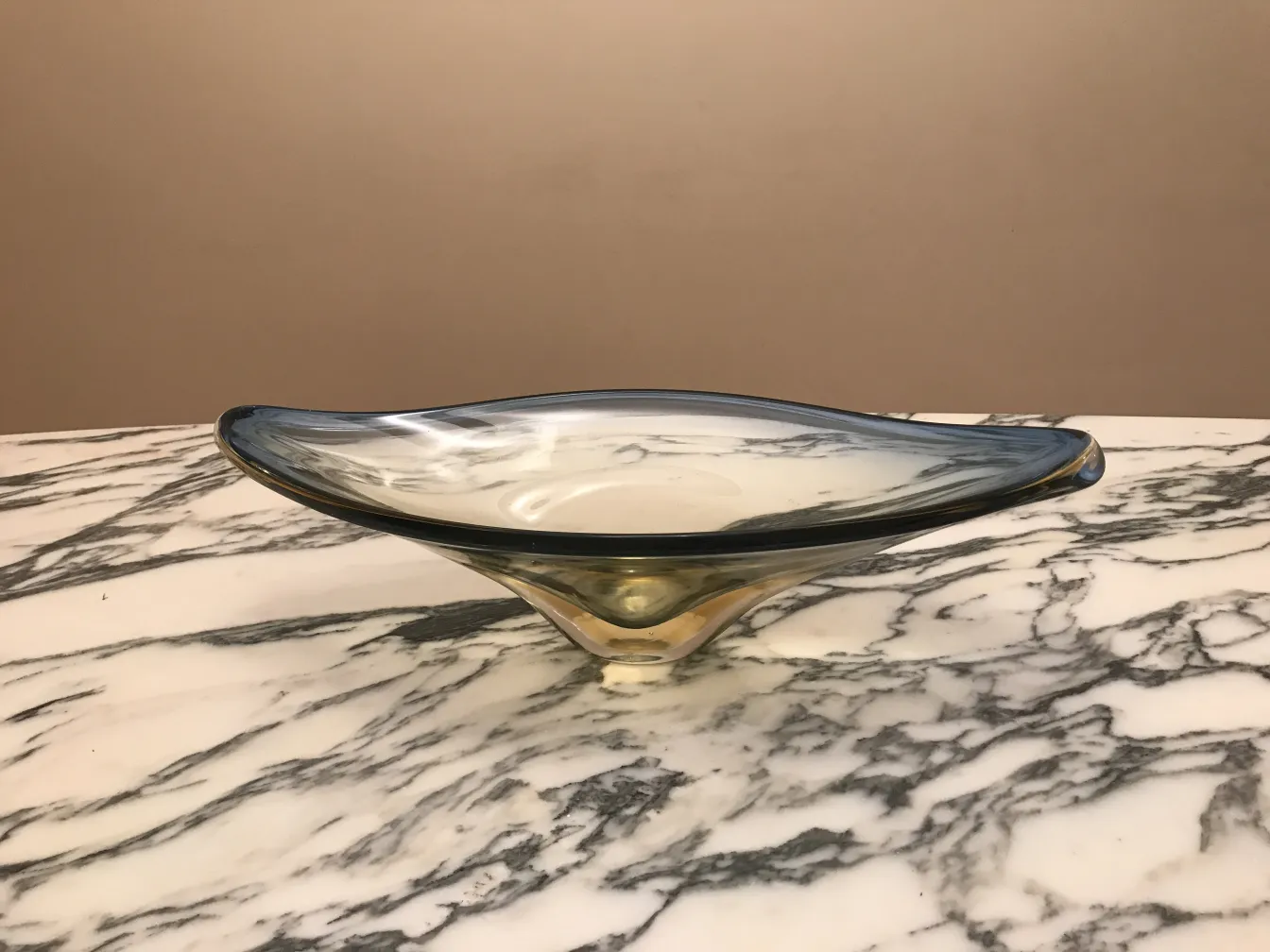 murano glass bowl with curved edge in light tones