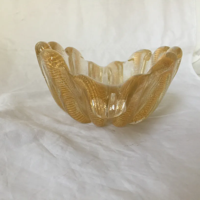 beautiful antique murano glass with wavy design, golden hue