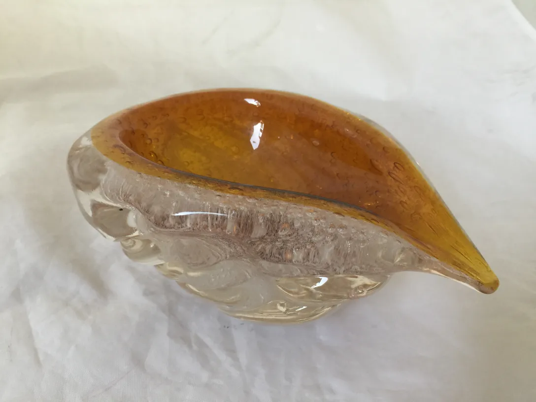 murano glass bowl with wavy design in amber tones
