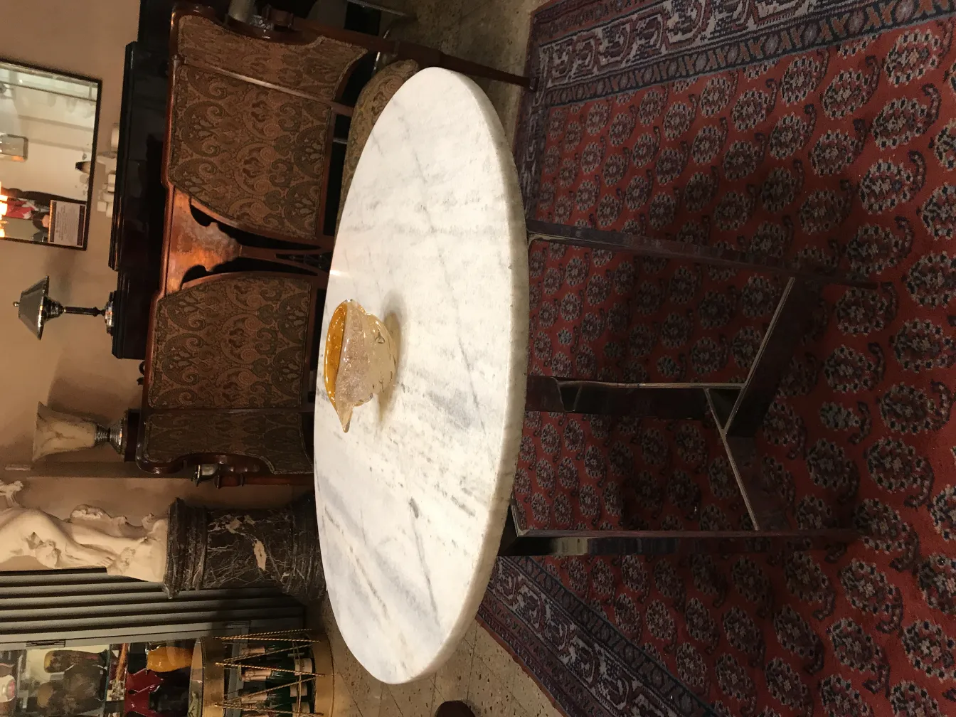 Antique Murano glass decorative piece on white table