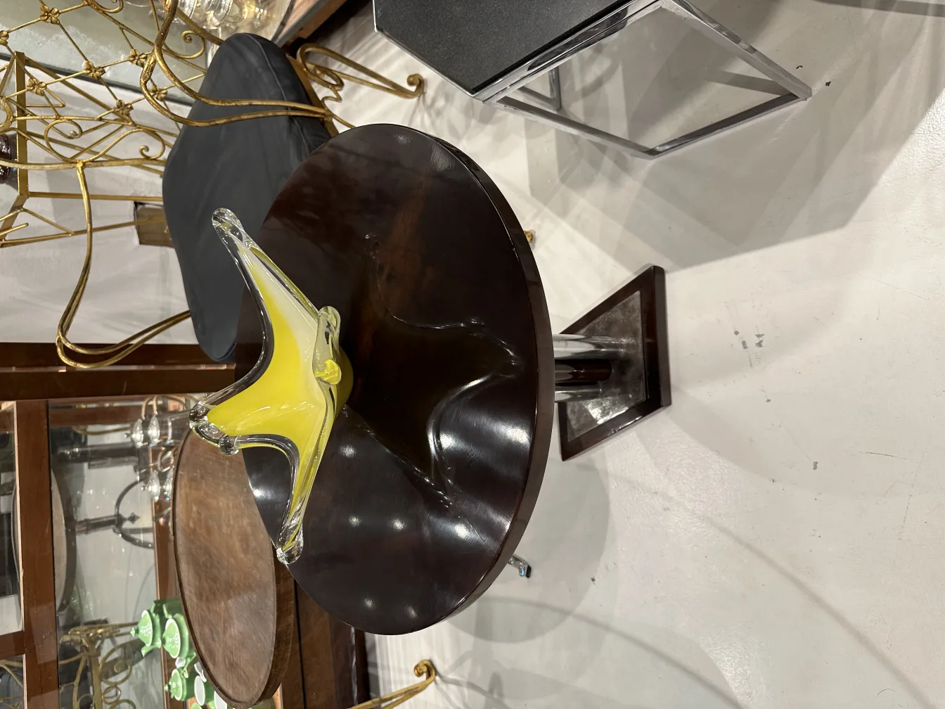 Antique Murano glass in yellow color on a table