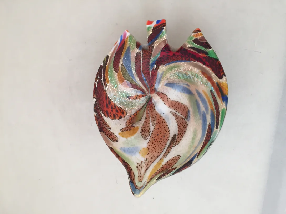 antique murano glass piece with colorful patterns