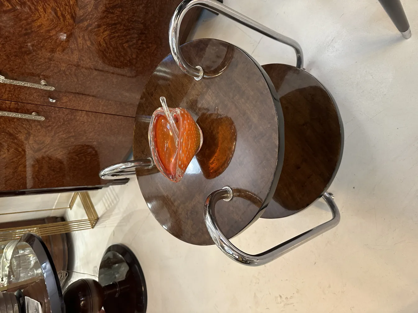 red and white murano glass figure on a table