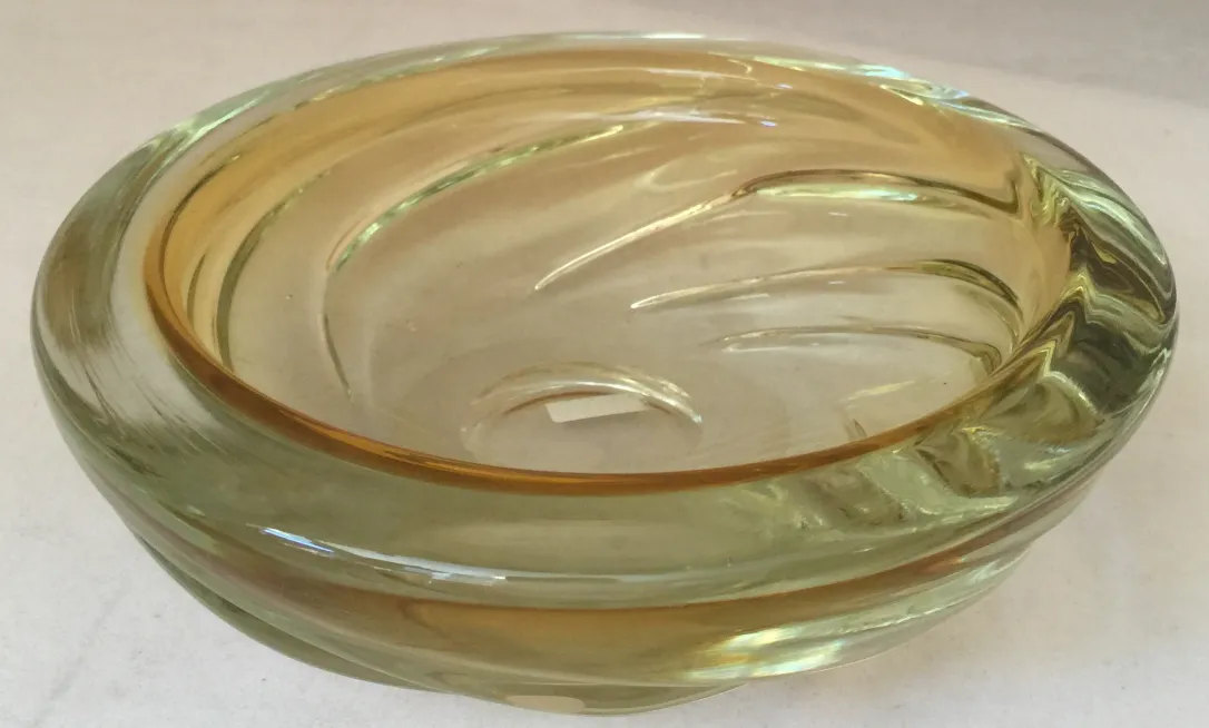 Antique Murano glass bowl in yellow and green tones, decorative and elegant.