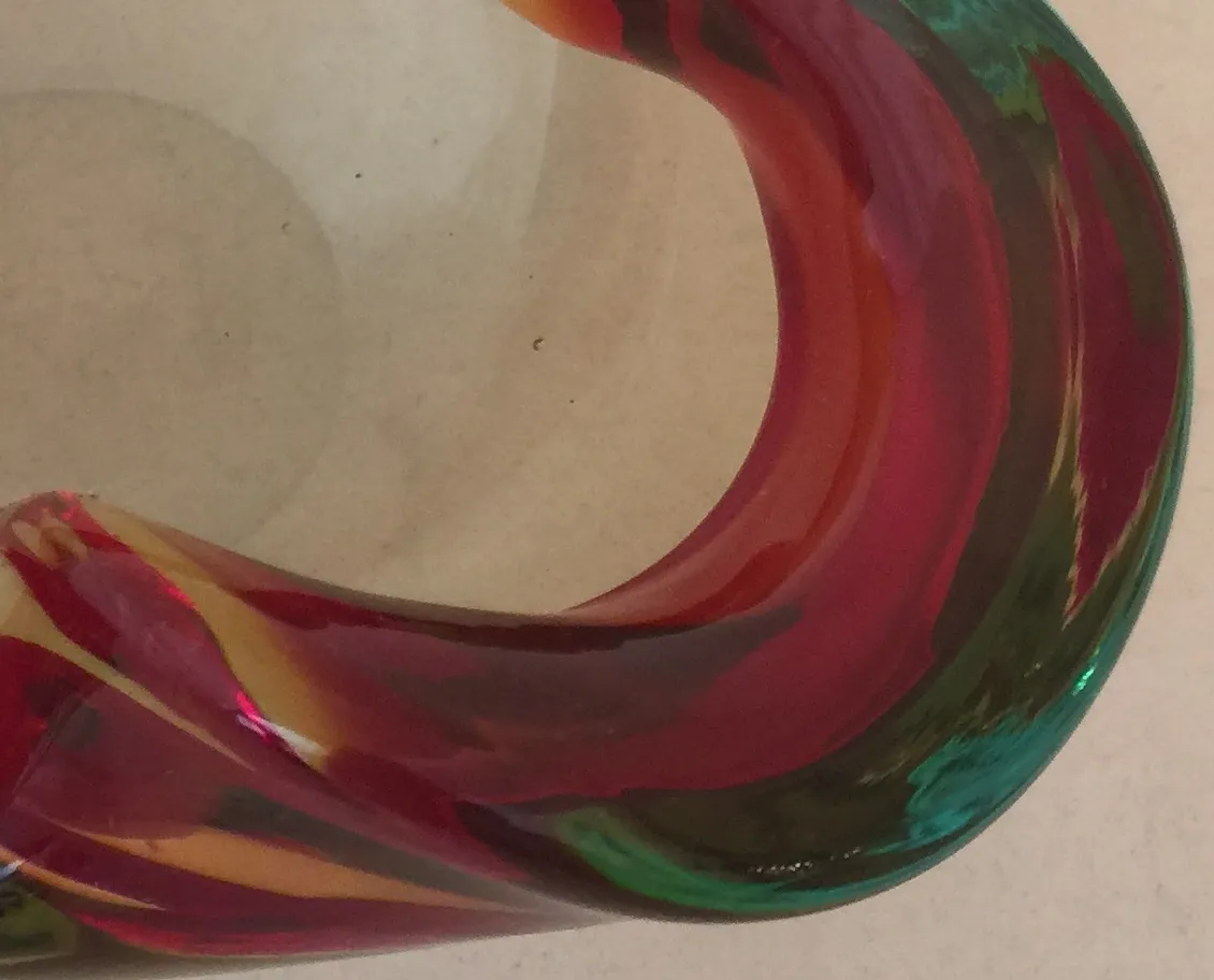 beautiful antique murano glass in shades of red and green