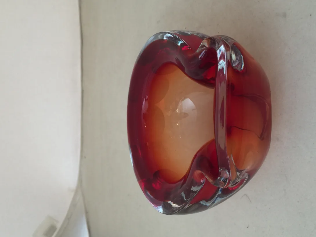 Decorative antique murano glass in shades of red
